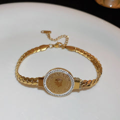 Titanium Steel Retro Affordable Luxury Diamond Portrait Round Plate Ear Clip Minority Design Earrings